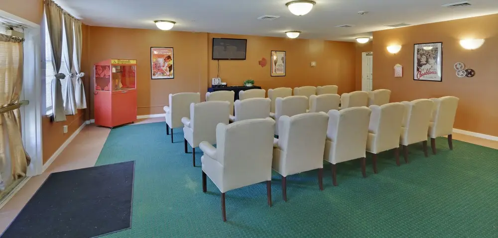 A theater with a popcorn machine in an elder care home in West Knoxville.